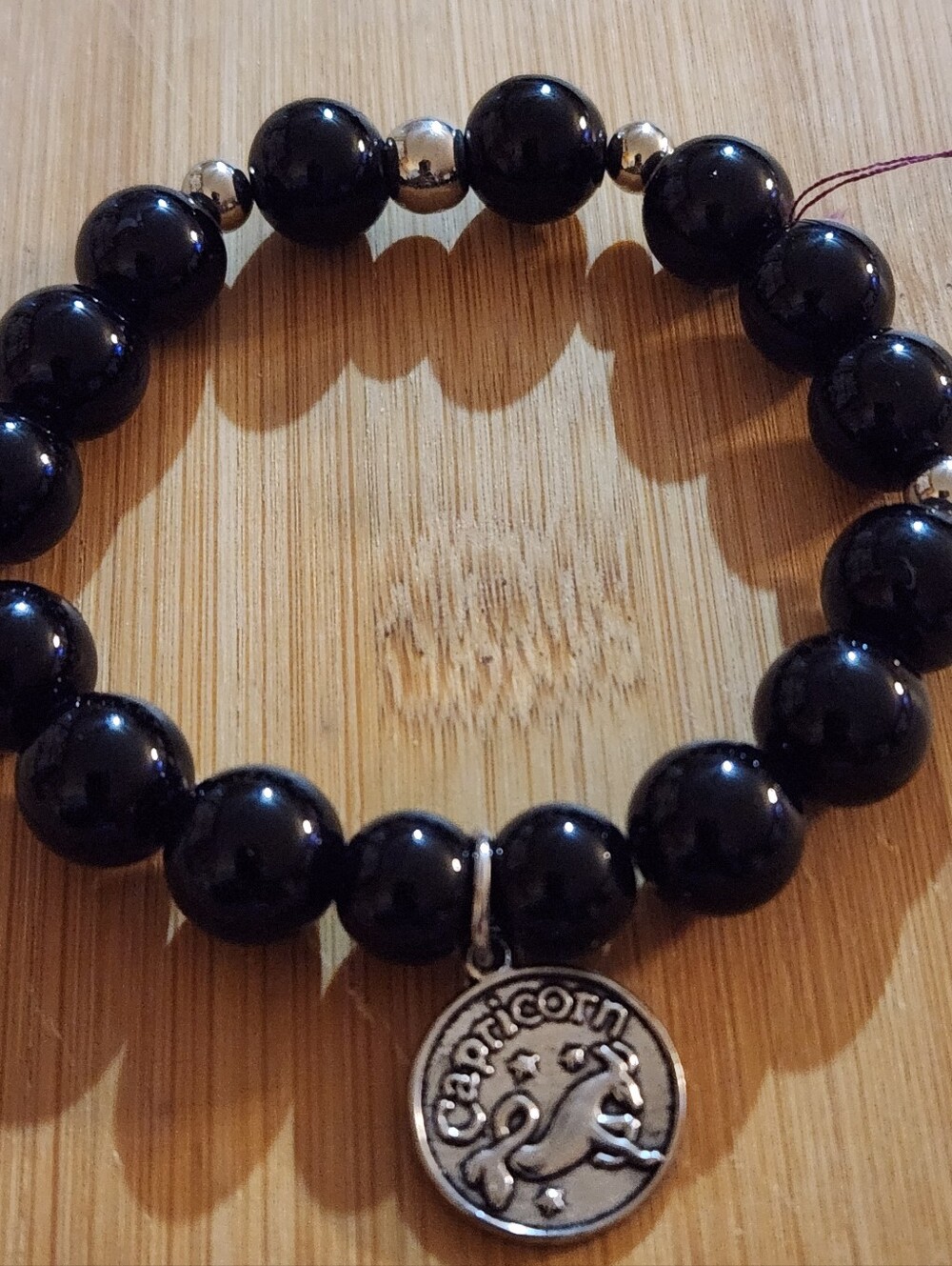 Hand Crafted Bracelet Stretch Black Beaded with Capricorn Charm Zodiac Sign